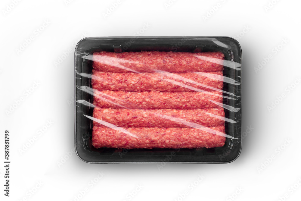 Sealable black plastic tray filled with fresh raw beef kebabs top-view. Packaging template mockup collection. With clipping Path included. Sealable black plastic tray filled with fresh raw beef kebabs top-view. Packaging template mockup collection. With clipping Path included.