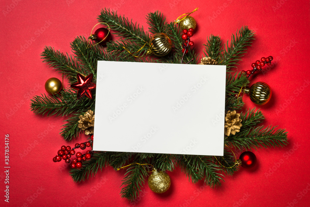 Fototapeta premium Christmas flat lay background with fir tree and decorations.