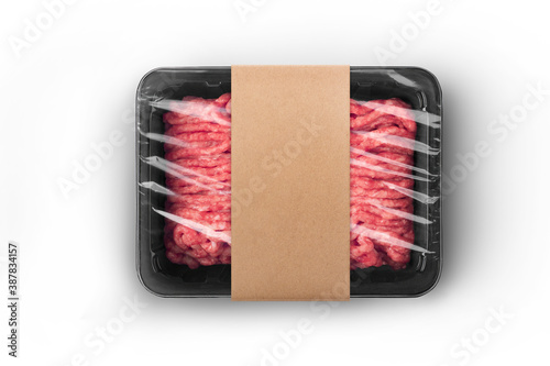 Quadro em tela Black sealable plastic tray with craft paper label filled with fresh raw minced meat top-view
