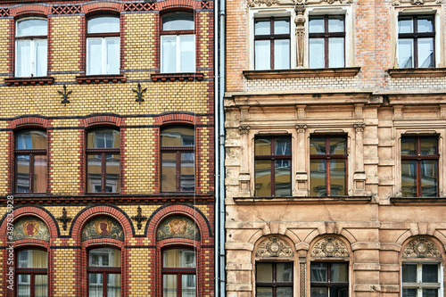 fragment of the facade of historic tenement houses