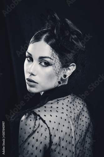 Woman beauty makeup on black background black widow concept © Jorgedeandresphoto