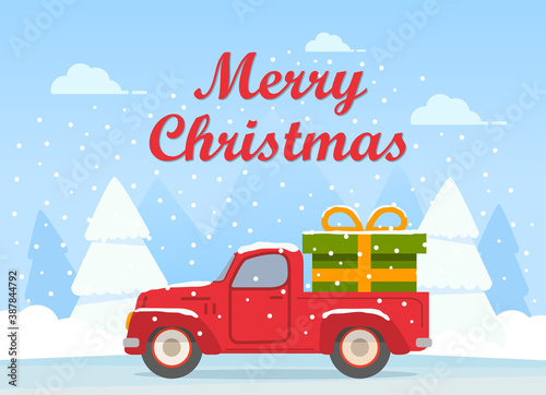 Retro pickup red truck with green gift box.Happy New Year postcard.Winter landscape with snowy fir trees.Festive Christmas banner.Falling snow.Vector flat illustration.Vehicle side view. 
