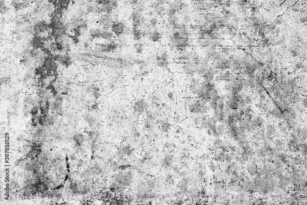 Fototapeta premium Texture of a concrete wall with cracks and scratches which can be used as a background
