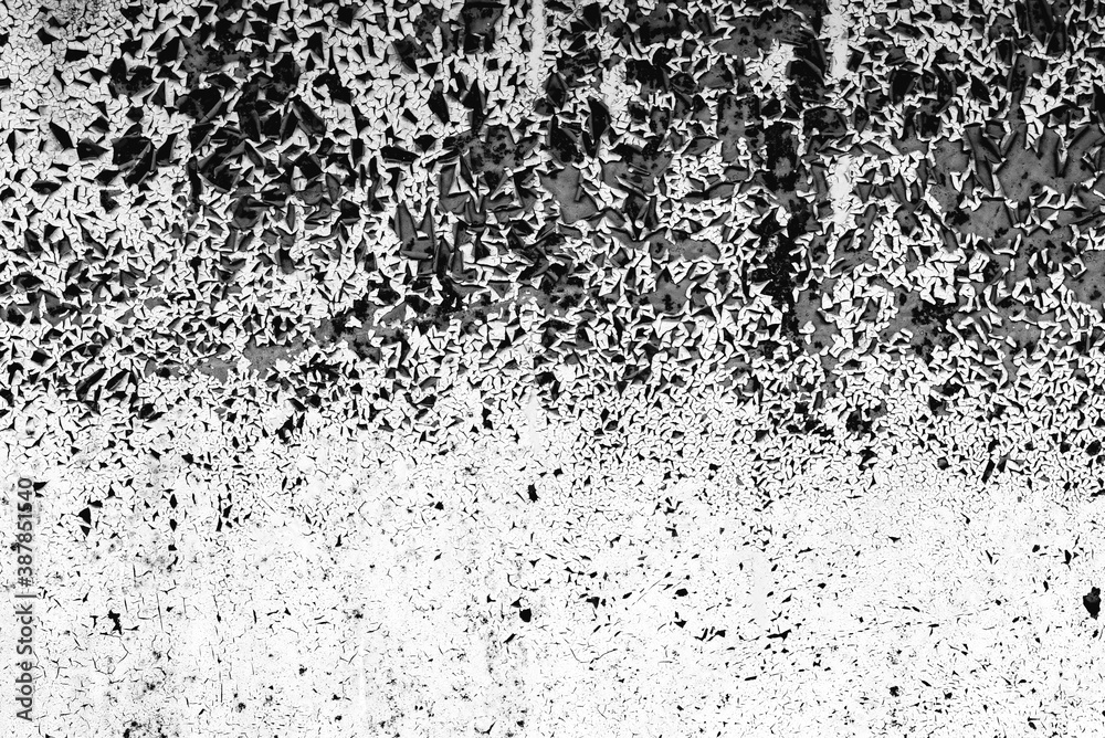 Metal texture with scratches and cracks which can be used as a background Metal texture with scratches and cracks which can be used as a background