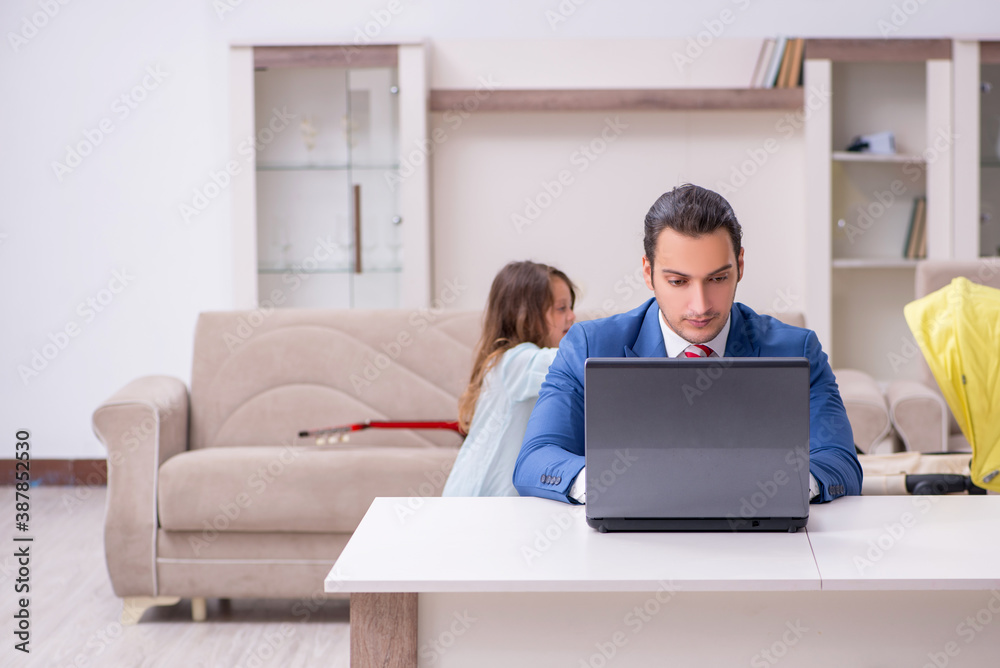 Young divorced father of two children working from house Young divorced father of two children working from house