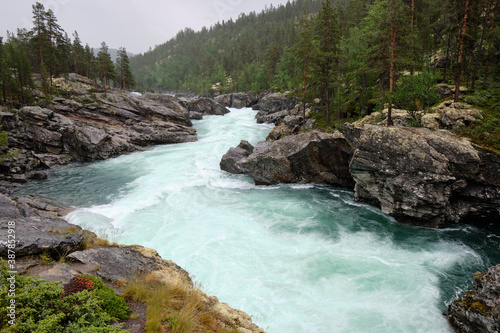 The Sjoa river provides the outlet from lake Gjende at Gjendesheim in the Jotunheimen mountains of Norway's Jotunheim National Park. It flows eastward into the Gudbrandsdalslågen river.