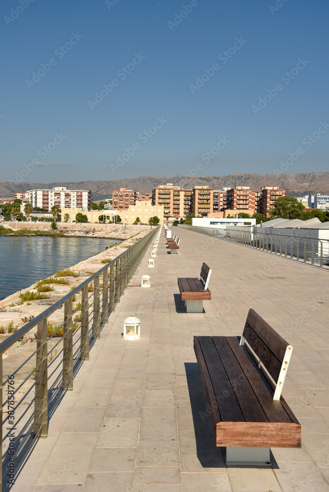 Benches in the Harbor by Morning at Summer Near the Sea