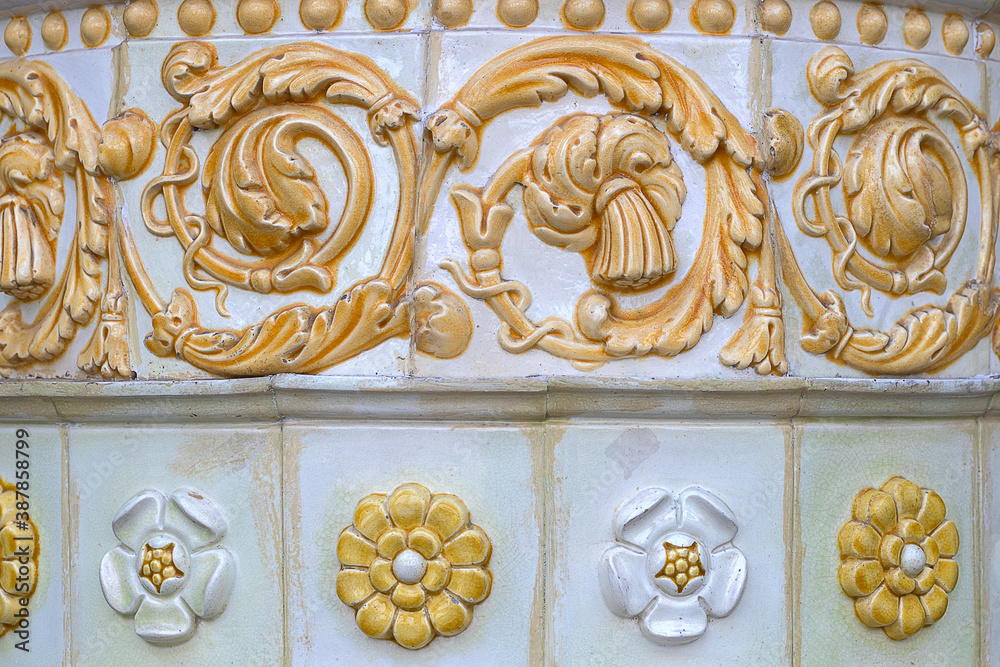 Detail of a floral ceramic decor. Vintage architectural color pattern.