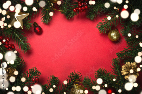 Christmas flat lay background with fir tree and decorations.
