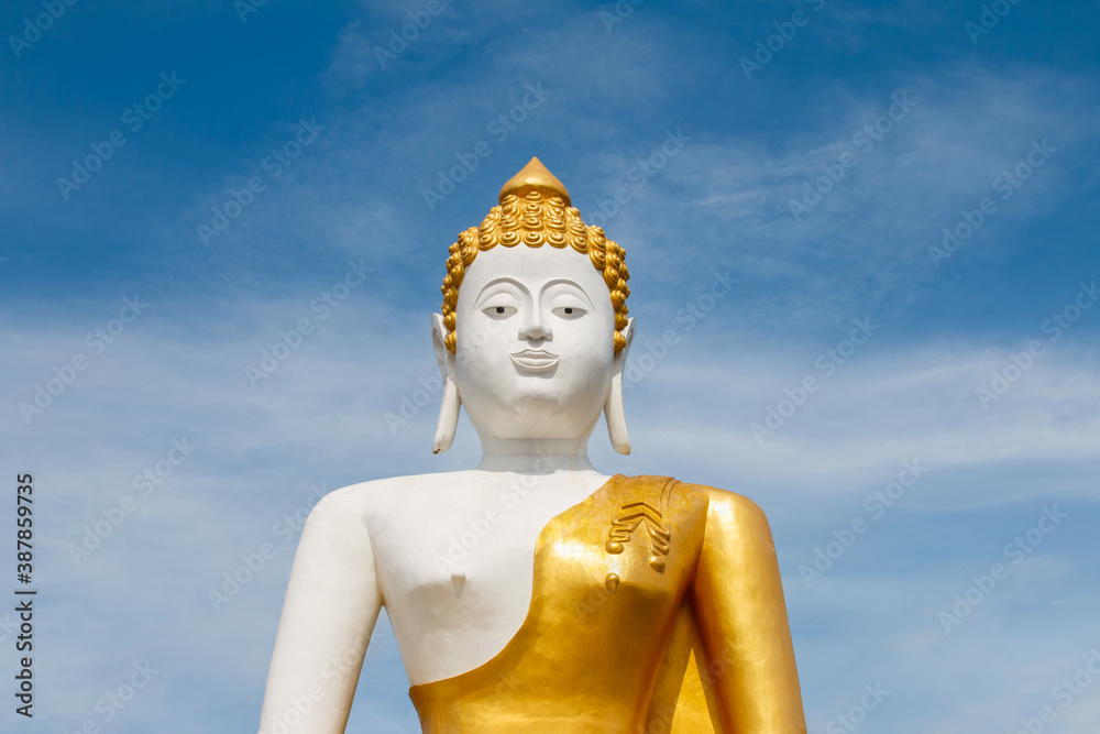 Big buddha in Wat Phra That Doi Kham (Temple of the Golden Mountain)