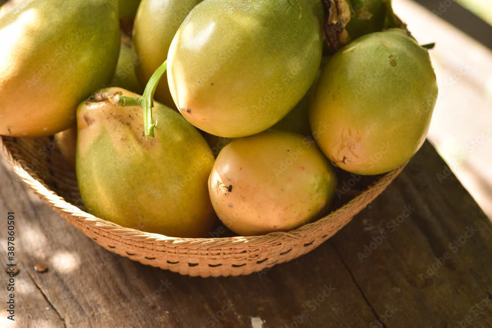 Healthy fruits. basket with fresh sweet passion fruit