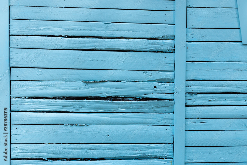 Blue painted wood wall made of old wood planks, use as texture with