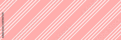 Vector Christmas background with diagonal stripes pattern, candy cane. Long horizontal banner.
