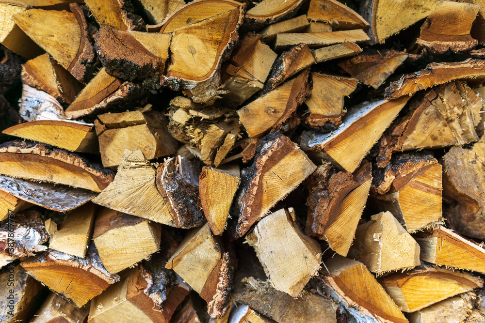 Stack of firewood, Textured of dry chopped logs for wallpaper, Natural wood background for design template. Stack of firewood, Textured of dry chopped logs for wallpaper, Natural wood background for design template.