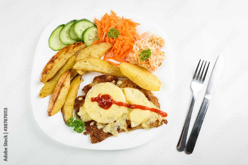 cutlet with pineapple and baked potatoes with bouquet of salads cutlet with pineapple and baked potatoes with bouquet of salads