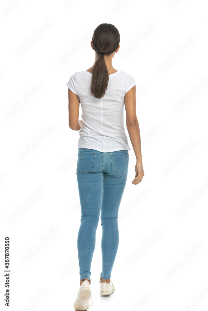 Back view of casual woman walking Back view of casual woman walking