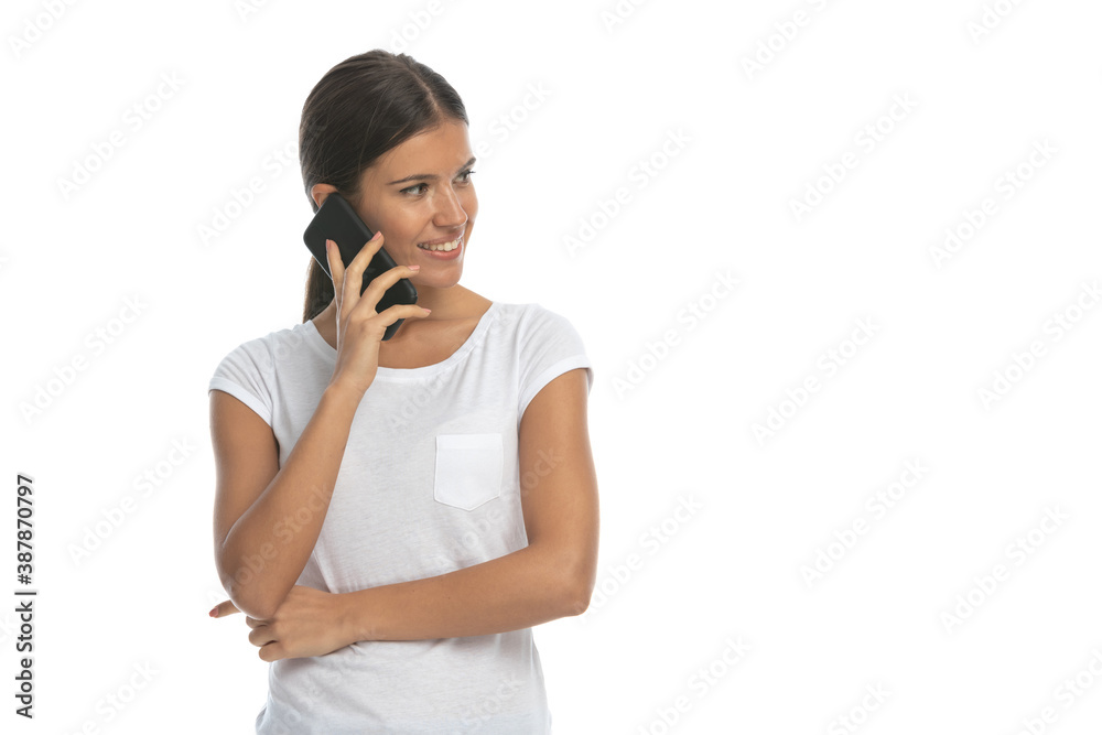Happy casual woman talking and smiling, looking away Happy casual woman talking and smiling, looking away