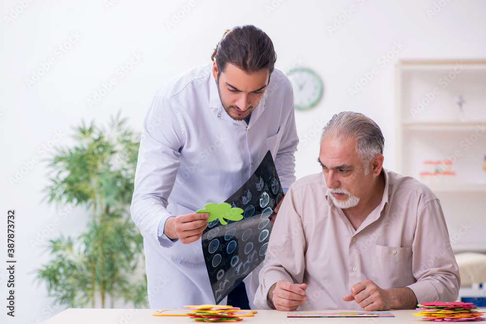 Doctor and patient suffering from Alzheimer disease