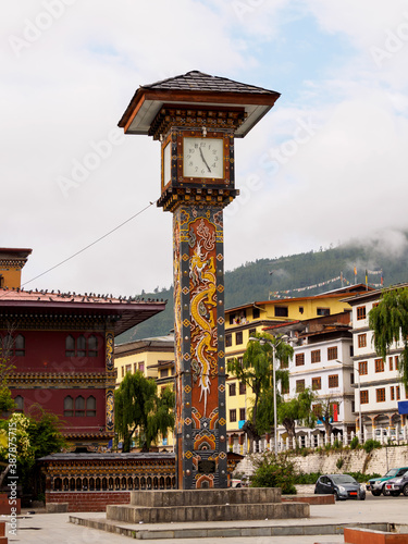 Clock tower in downtown Thimphu, Bhutan photo