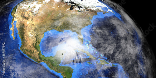 Hurricane Zeta and Epsilon with Earth shown from Space. Elements of this high resolution 3D rendering are furnished by NASA. photo