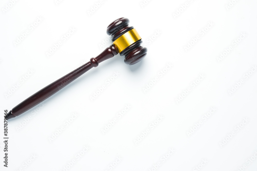 A flatlay picture of gavel on isolated white background. A flatlay picture of gavel on isolated white background.