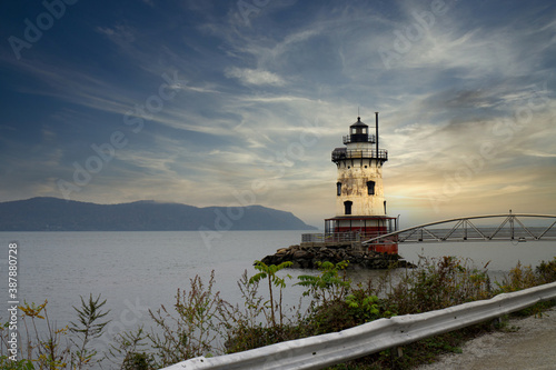 Sunset view of Sleepy Hollow lighthouse in Tarrytown over Hudson River on a cloudy day