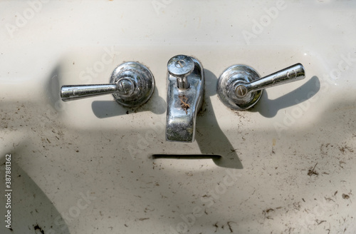 seeing a  face in a  ceramic and chrome bathtub (or everyday object) is a science known as  pareidolia  photo