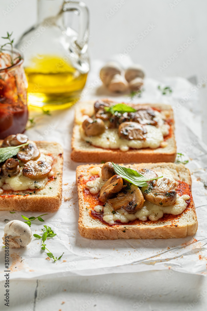 Rustic Toast made of mushrooms, cheese and pepper
