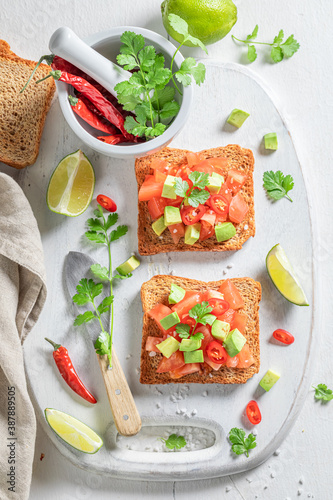 Rustic Toast with tomatoes, avocado and coriander