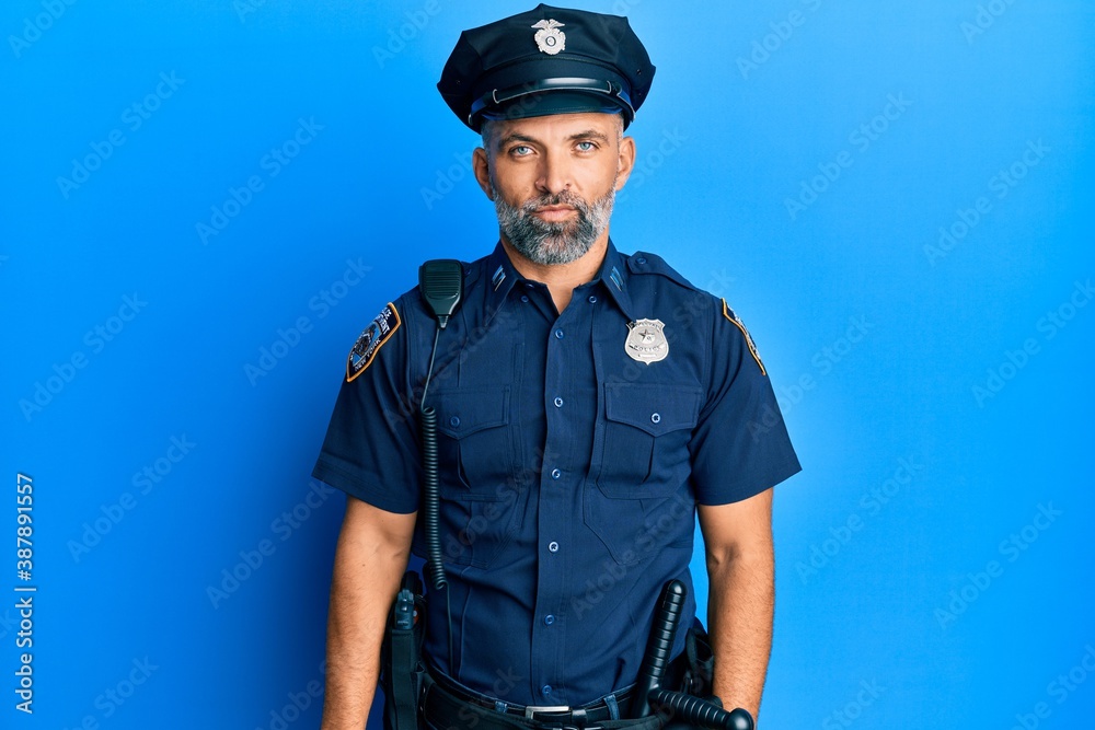 Middle age handsome man wearing police uniform looking sleepy and tired, exhausted for fatigue and hangover, lazy eyes in the morning. Middle age handsome man wearing police uniform looking sleepy and tired, exhausted for fatigue and hangover, lazy eyes in the morning.
