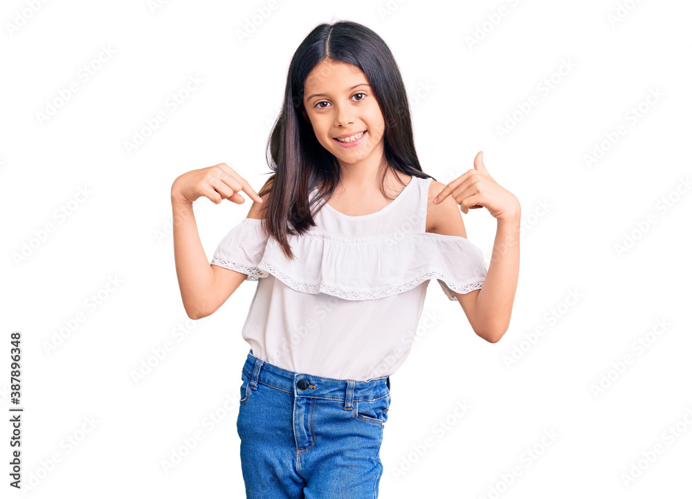 Beautiful child girl wearing casual clothes looking confident with smile on face, pointing oneself with fingers proud and happy.