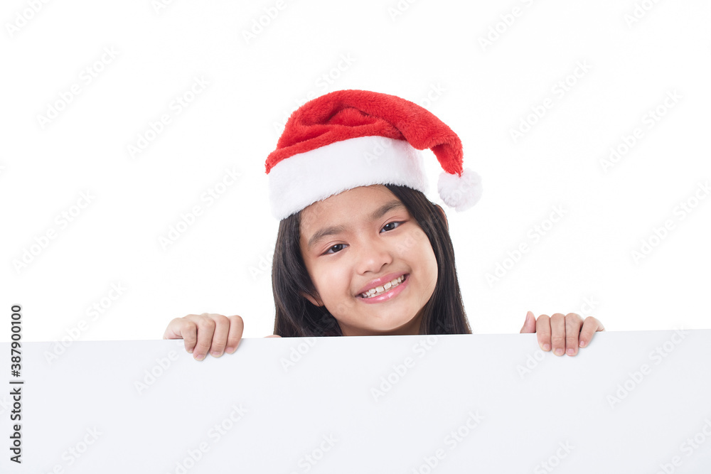 Happy little girl holding a blank board