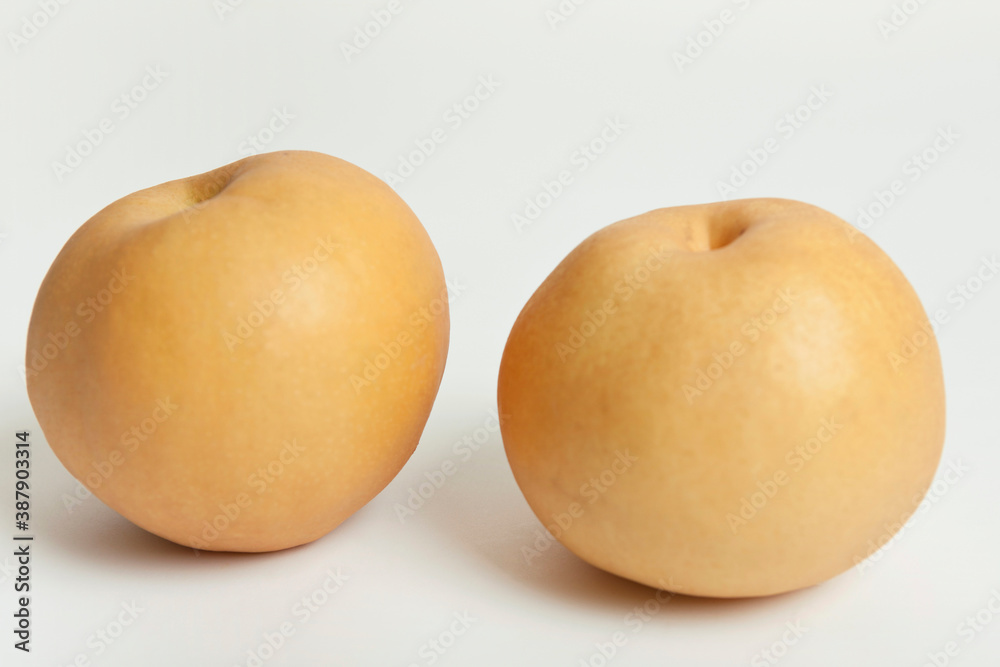 close up of two pears