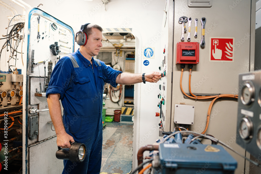 Marine engineer officer controlling vessel enginesand propulsion in