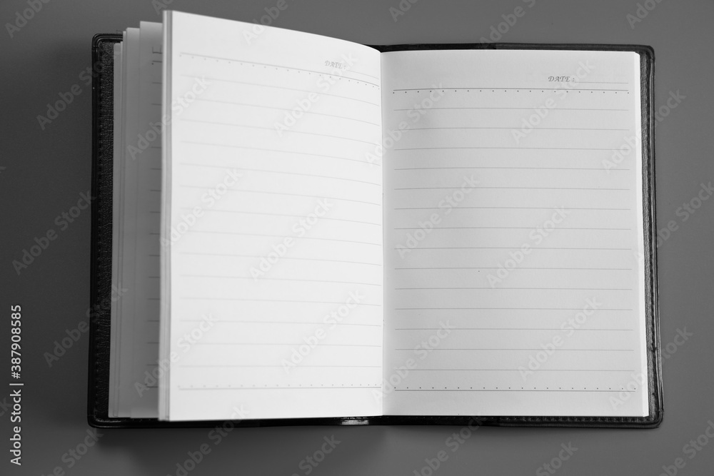 white blank note paper on gray background white blank note paper on gray background