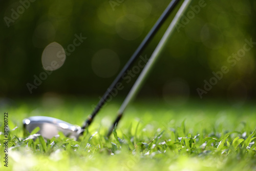 Out focus of golf equipment on golf course background
