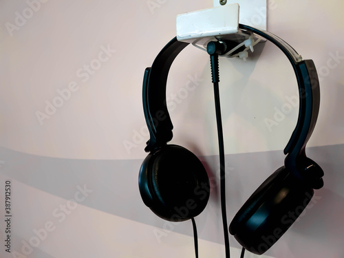 Headphones in front of  background, monotint headphones.