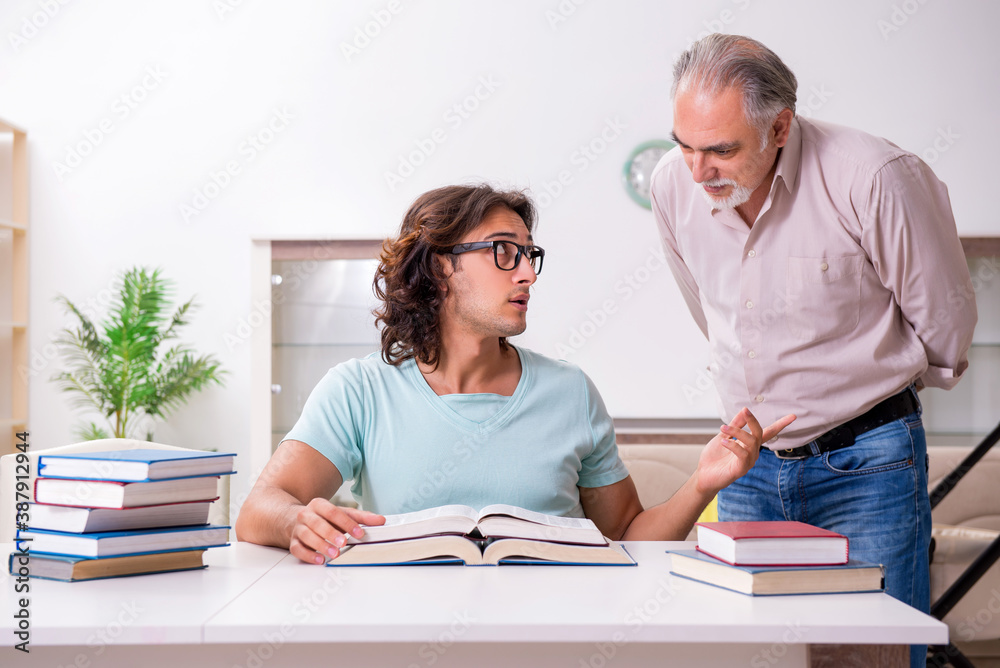 Retired grandfather looking after newborn at home Retired grandfather looking after newborn at home