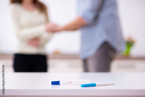 Young couple in unexpected pregnancy concept at home