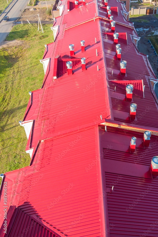 iron roof of the building and air ducts photo taken from a drone