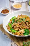 Thai food; Fried noodle with pork in soy sauce and vegetable