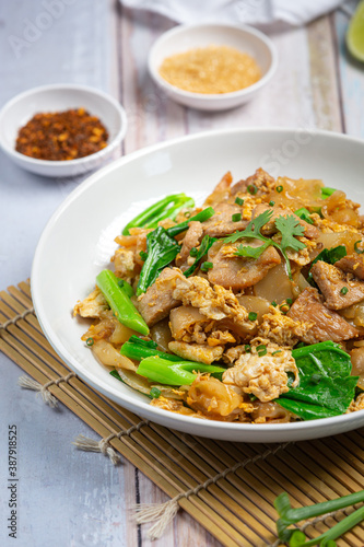 Thai food; Fried noodle with pork in soy sauce and vegetable