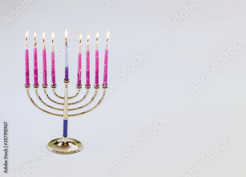 Jewish Holiday symbol Hanukkah menorah in the orthodox Jew Festival on white isolate background