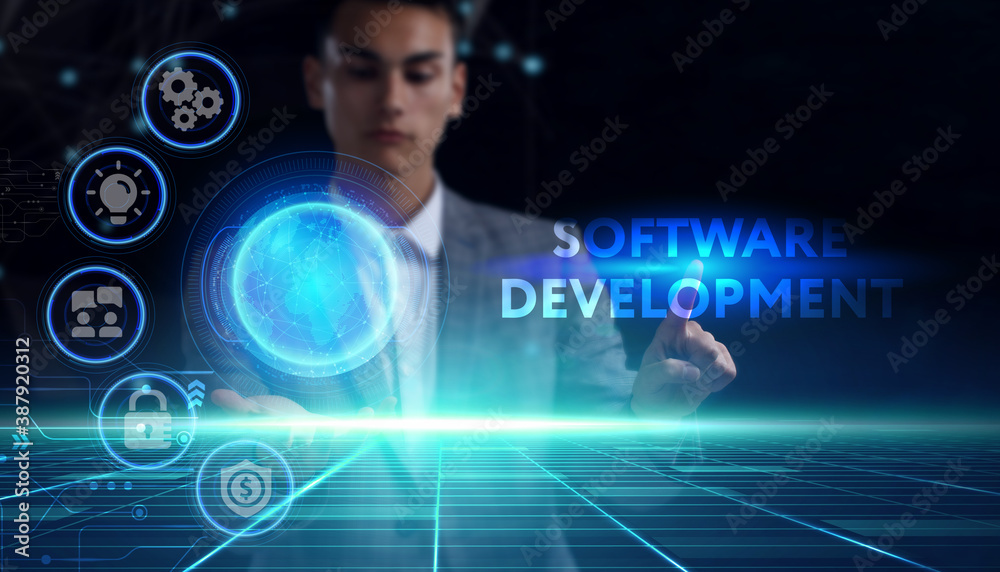 Business, technology, internet and network concept. Young businessman thinks over the steps for successful growth: Software development Business, technology, internet and network concept. Young businessman thinks over the steps for successful growth: Software development