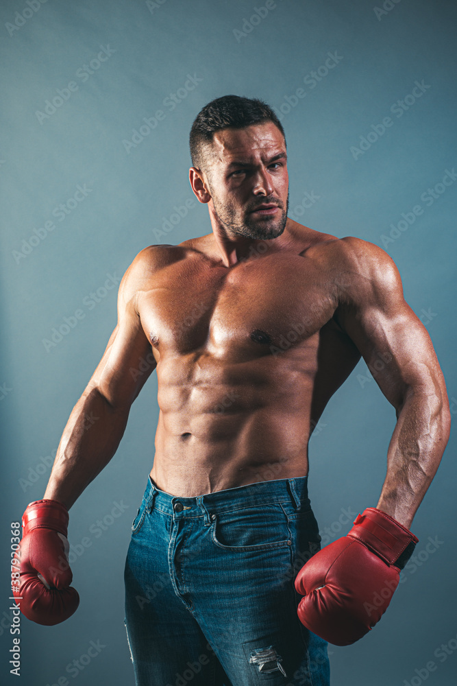 Men power. Success guy in red boxing gloves.