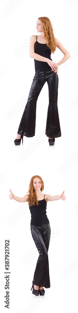 Redhead woman in black bell bottom pants on white Redhead woman in black bell bottom pants on white