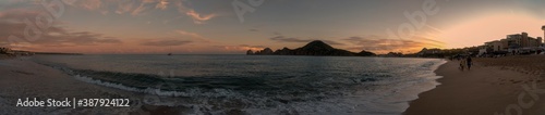 A panoramic view of one of the beaches at Cabo San Lucas  Mexico  at the tip of the Baja Peninsula  during late sunset.