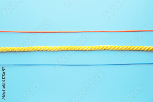 Three colorful ropes orange...