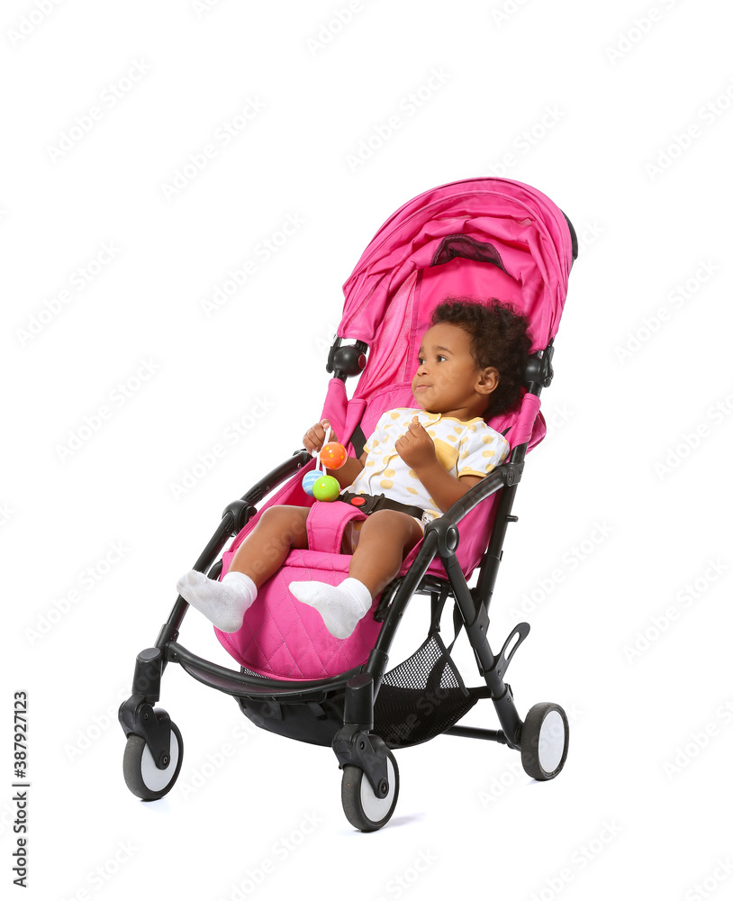 Cute African-American baby in stroller on white background Cute African-American baby in stroller on white background
