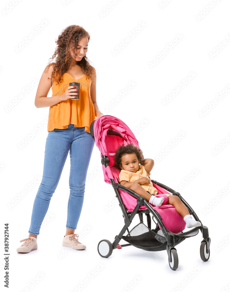 African-American woman and her cute baby in stroller on white background African-American woman and her cute baby in stroller on white background